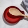 Descanso Redondo de Colher Signature Vermelho Le Creuset